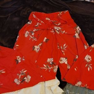Red floral wrap pants